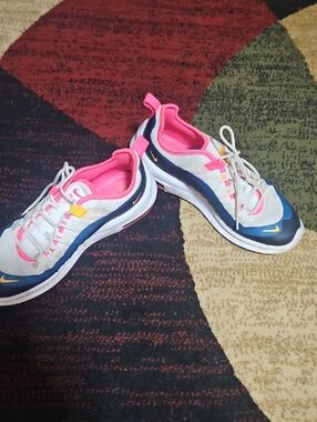 Nike Women's Pink and Navy Blue Athletic Sneakers with Yellow Accents